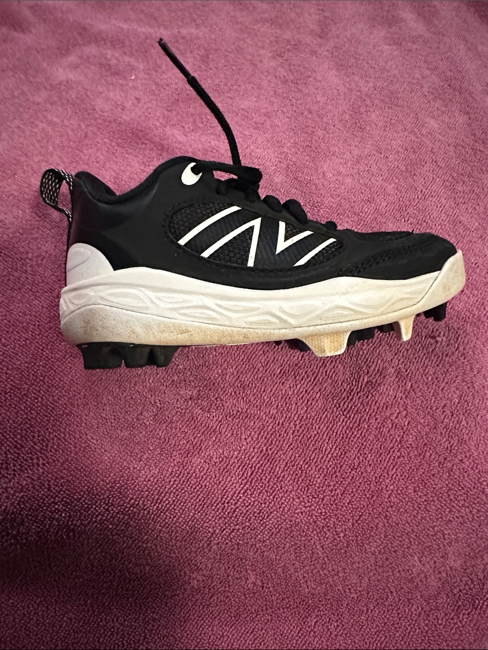 Kids Black and White Athletic Cleats new balance